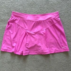 Pink Nike athletic skirt with built in shorts